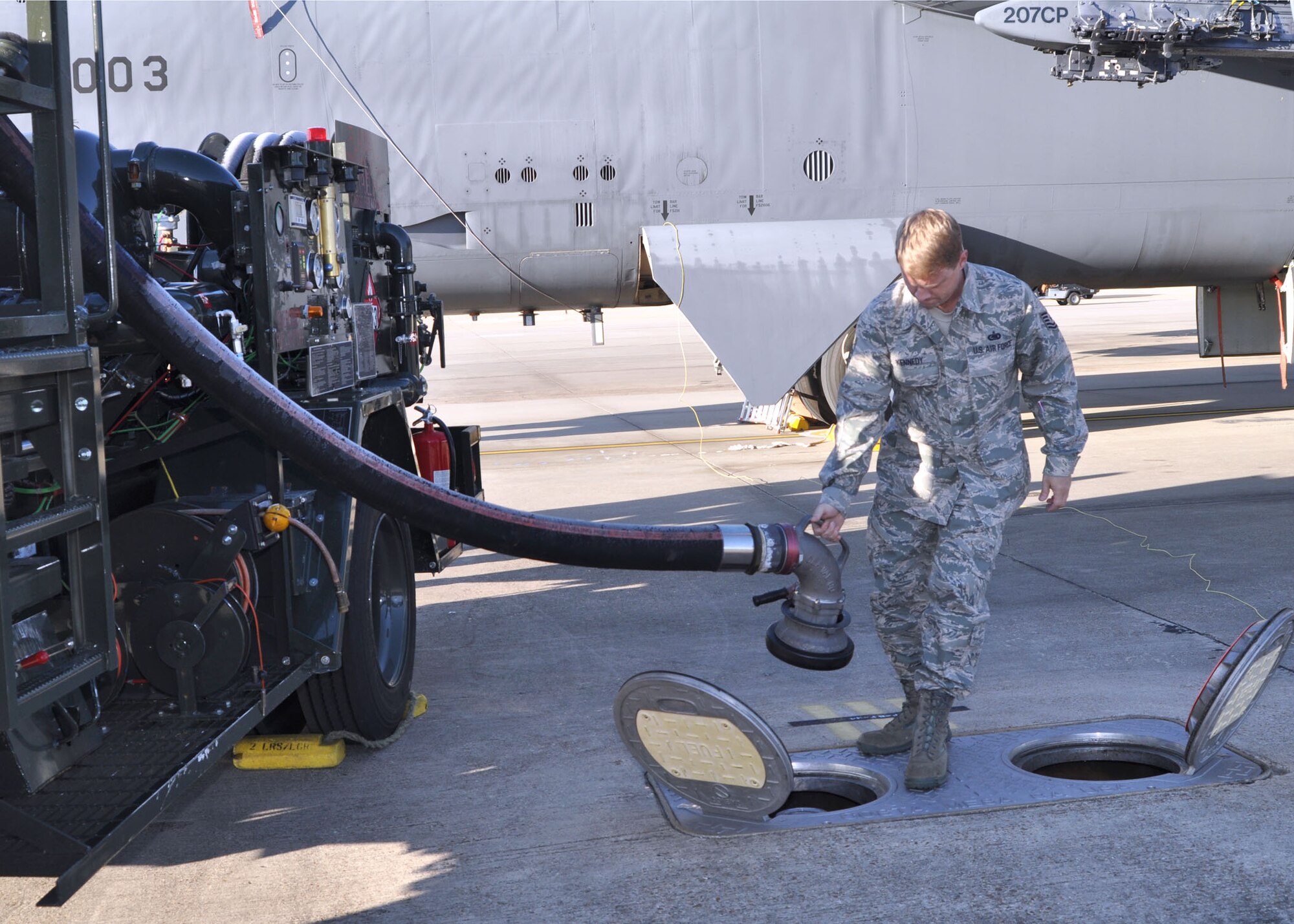 Tech. Sgt. Jayson Kennedy, a fuels technician for the 917th Wing at Barksdale Air Force Base, La., positions the “moose head” piping valve from his hydrant vehicle onto the main outlet valve which takes fuel from the pit to the vehicle. The R-12 hydrant acts as the final filter in a two-part process. The fuel for the B-52 Stratofortress is initially filtered at a pump house, removing sediments and other foreign particles that may have gotten into it. (U.S. Air Force photo/Senior Airman Crystal Jordan)