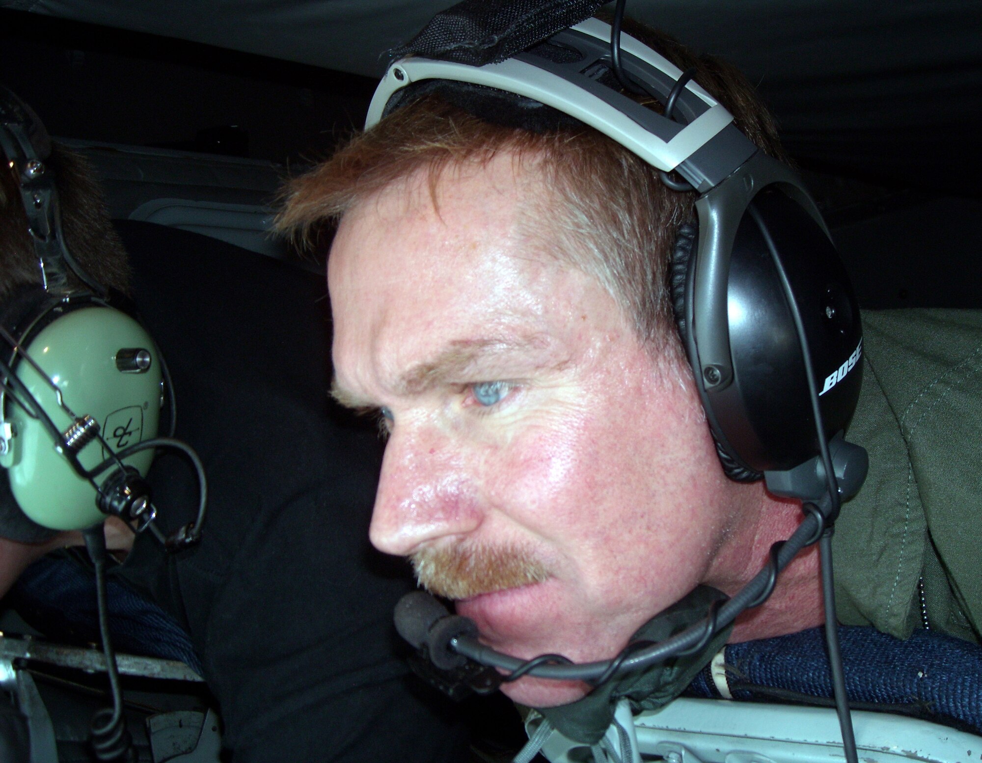 Chief Master Sgt. Christopher Powell, 100th Operations Group boom operator, guides a KC-135 Stratotanker boom pod as he refuels Santa?s ?sleigh? Dec. 8. During an eight-hour mission, the chief pumped more than 40,000 tons of fuel into 29 Royal Danish Air Force F-16 Fighting Falcons and one sleigh. Precision is paramount in a boom operator?s job as a lack of attention to detail could prove catastrophic. (U.S. Air Force photo/Tech. Sgt. Kevin Wallace)