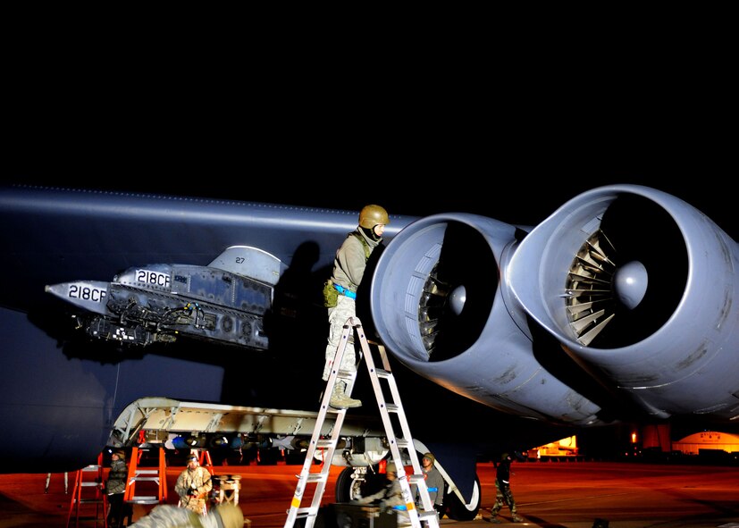 Staff Sgt. Ben Norton, 2d Aircraft Maintenance Squadron, works to re-generate a B-52 at Base X Dec. 8.  Airmen work around the clock to re-generate B-52H Stratofortresses at Base X, a simulated forward operation location, as part of an inspection to determine the bases readiness to rapidly deploy assets and personnel anywhere in the world. (U.S. Air Force photo by Staff Sgt. Sarah E. Stegman)(RELEASED)
