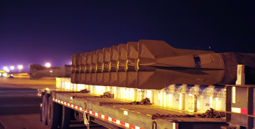 Weapons are lined up on a flatbed trailer ready to be loaded onto B-52s at Base X during a conventional operational readiness inspection here.  (U.S. Air Force photo by Staff Sgt. Sarah E. Stegman)(RELEASED)