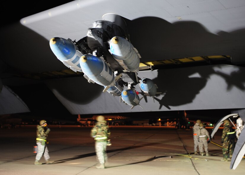 Maintainers perform a walk around a B-52 at Base X at the beginning of their shift.  Airmen were tasked to re-generate four B-52s at a simulated forward operating location as part of an Air Combat Command directed conventional operational readiness inspection here. (U.S. Air Force photo by Staff Sgt. Sarah E. Stegman)(RELEASED)