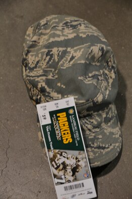 The Green Bay Packers honored military families during their recent Monday Night Football game against the Baltimore Ravens. The Murray family was recognized at half-time on the 50-yard line at Lambeau Field and was surprised by a personal message from Lt. Col. David Murray, a nurse practitioner with the 115th Medical Group deployed to Balad Air Base, Iraq as a flight commander of the intermediate care ward at the Balad Theatre Hospital. (U.S. Air Force photo by Tech. Sgt. Don Nelson)