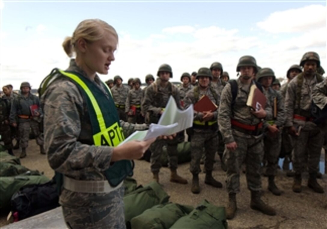 U.S. Air Force 2nd Lt. Kady Rohan, air passenger terminal officer in charge, briefs personnel before they process the deployment line during a Phase I operational readiness exercise at Langley Air Force Base, Va., on Dec. 3, 2009.  Wing exercise evaluation team members will assess the ability of 1st Fighter Wing units to deploy cargo, aircraft and airmen within a limited timeframe.  