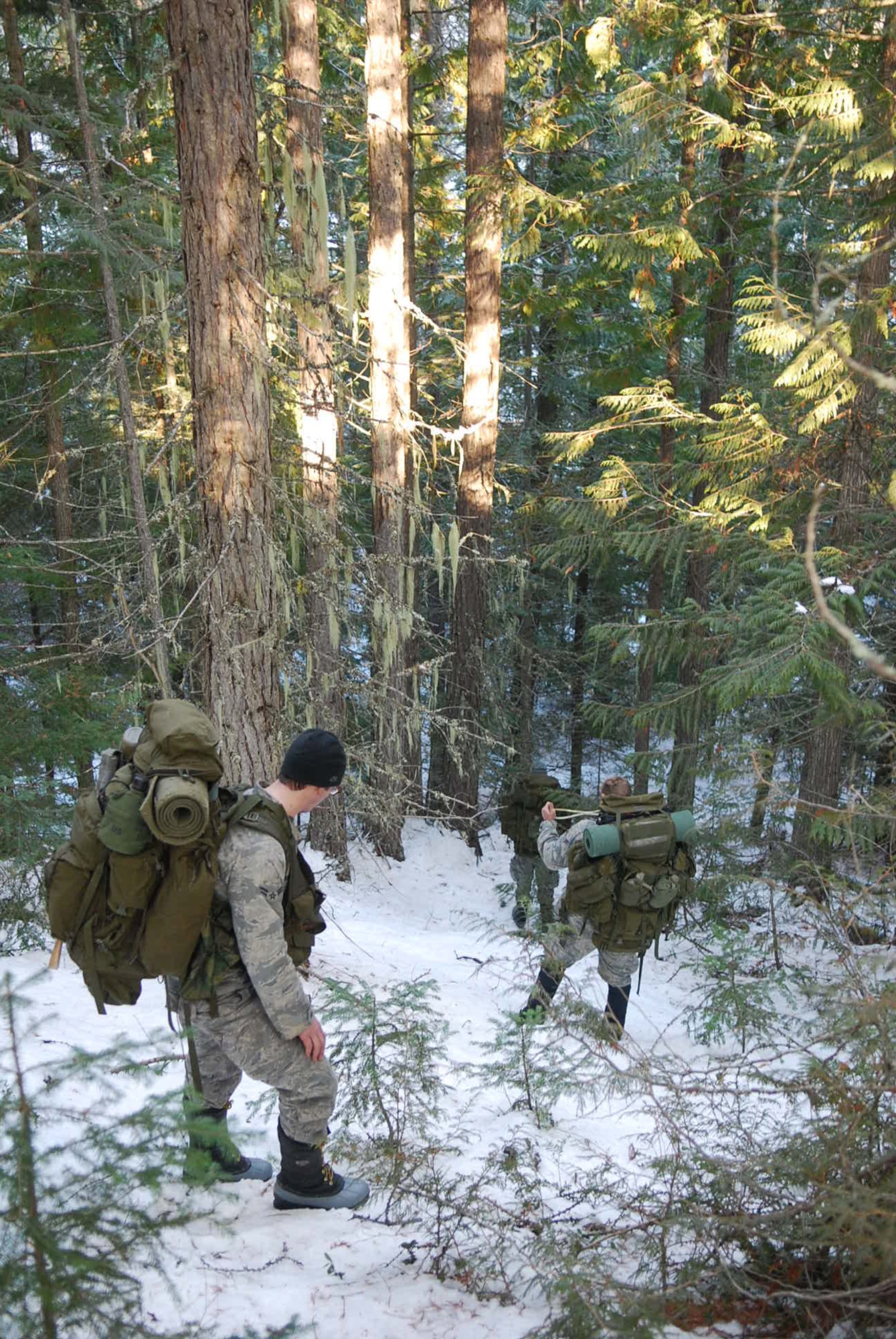Students navigate through the Kaniksu National Forest during the Integrated phase of training. (U.S. Air Force photo/Senior Airman Emerald Ralston)