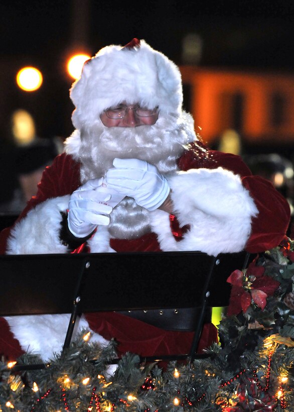 Santa makes his holiday debut during the annual Tree Lighting Ceremony held at Fort McArthur in San Pedro, Calif., Dec. 4. Other festivities included snow day with children's play area covered with more than 20 tons of man-made snow, two 50-ft. sled runs and a holiday story reading by Col. Anita Latin, 61st Air Base Wing commander. (Photo by Atiba S. Copeland)
