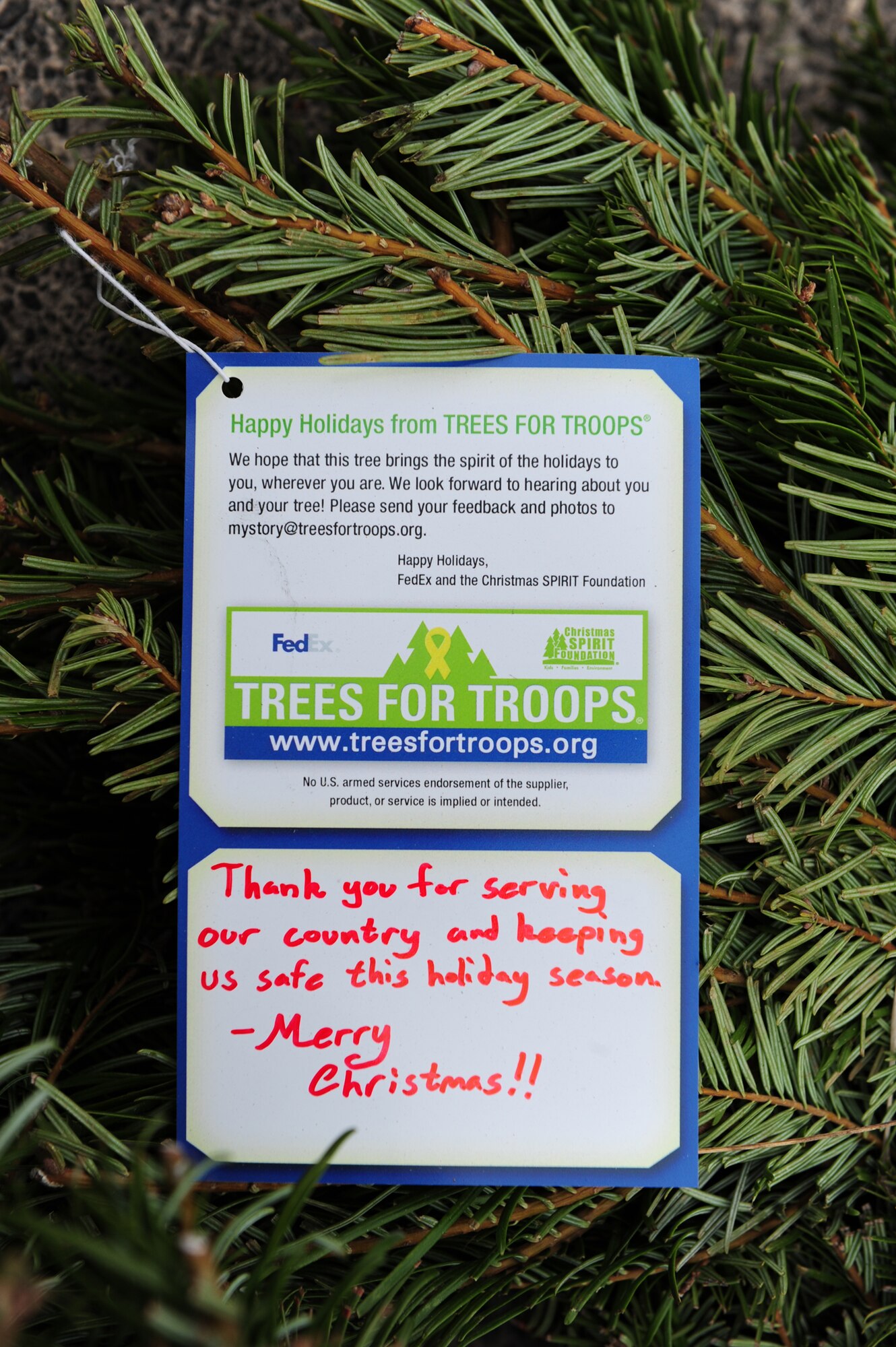 NELLIS AIR FORCE BASE, Nev.-- A holiday message is written on every Christmas tree from the individual who donated to the Trees for Troops program.  More than 700 Christmas trees were donated and delivered to the base Chapel Dec. 11. For the fifth consecutive year, The Trees for Troops program, sponsored by the Christmas SPIRIT Foundation and FedEx Corp, provided trees for servicemembers. This year, 15,000 trees from 29 states are expected to be delivered to military bases in the United States and overseas. 
(U.S. Air Force Photo / Staff Sgt. William P. Coleman)