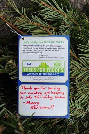 NELLIS AIR FORCE BASE, Nev.-- A holiday message is written on every Christmas tree from the individual who donated to the Trees for Troops program.  More than 700 Christmas trees were donated and delivered to the base Chapel Dec. 11. For the fifth consecutive year, The Trees for Troops program, sponsored by the Christmas SPIRIT Foundation and FedEx Corp, provided trees for servicemembers. This year, 15,000 trees from 29 states are expected to be delivered to military bases in the United States and overseas. 
(U.S. Air Force Photo / Staff Sgt. William P. Coleman)