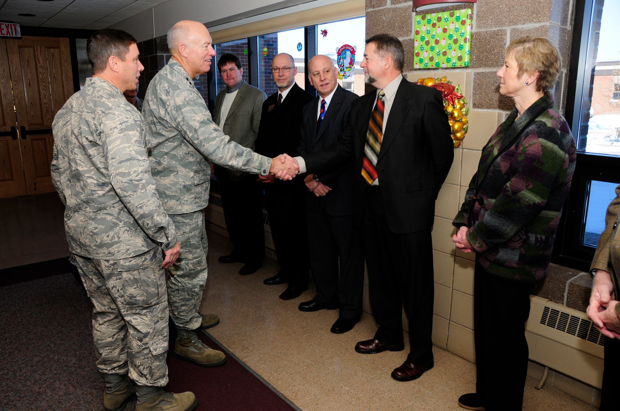 U.S. Air Force Lt. Gen. Harry Wyatt, Director of the Air National Guard, meets local civic leaders during a luncheon at the 148th Fighter Wing Air National Guard base in Duluth, Minn. Dec. 11th, 2009.  Lt. Gen Wyatt was briefed about the unit and the strong community involvement from the local area for the guard base. (U.S. Air Force photo by Master Sgt. Jason W. Rolfe)