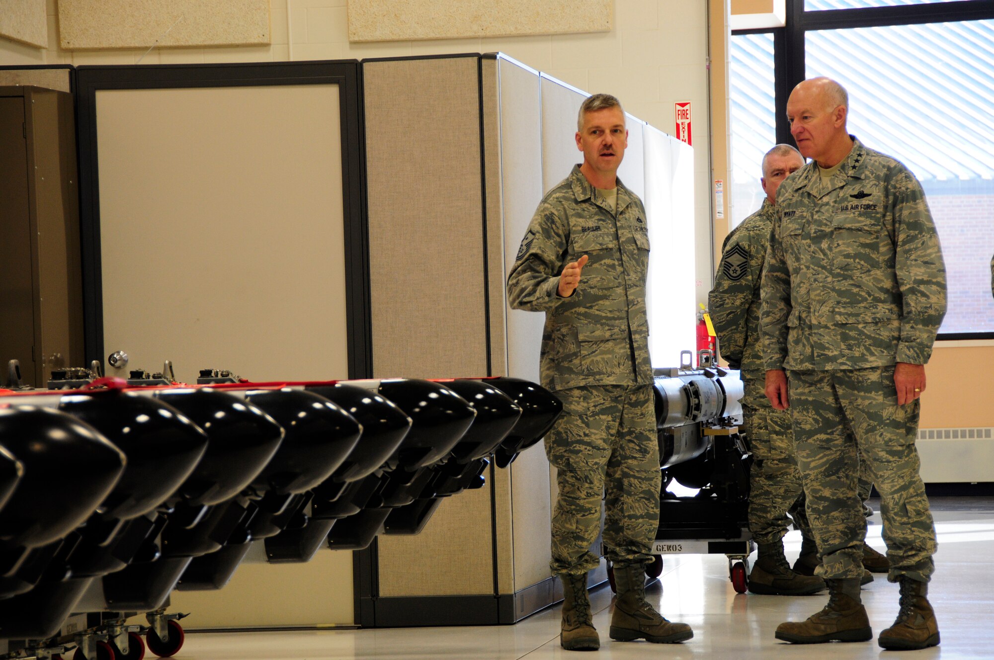 U.S. Air Force Master Sgt. Lawrence Beaulier speaks to Lt. Gen. Harry Wyatt, Director of the Air National Guard, about capabilities of the 148th Fighter Wing?s maintenance shops at the guard base in Duluth, Minn. Dec. 11th, 2009.  Lt. Gen Wyatt toured the guard base and met with many of the wing?s members. (U.S. Air Force photo by Master Sgt. Jason W. Rolfe)