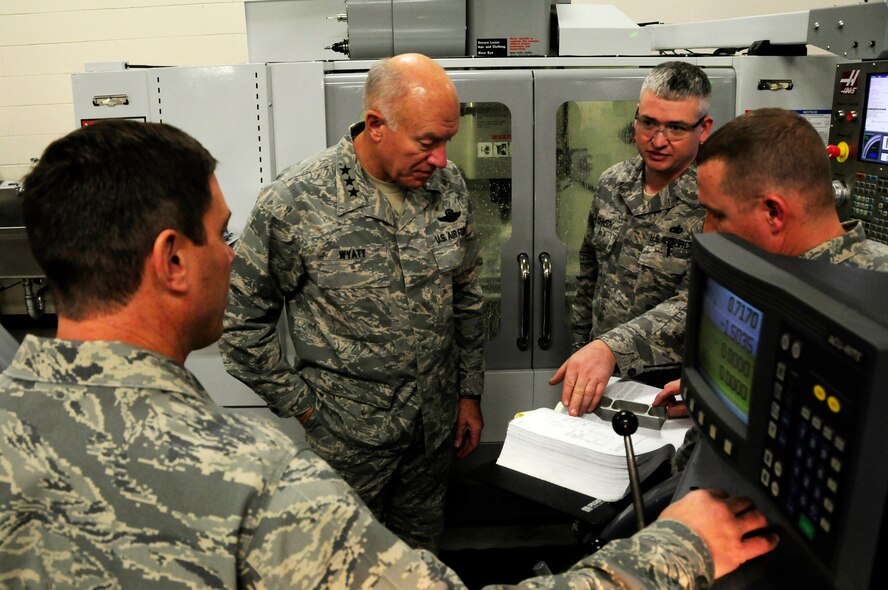 U.S. Air Force Lt. Gen. Harry Wyatt, Director of the Air National Guard, is shown the capabilities of the sheet metal and fabrication shop at the 148th Fighter Wing Air National Guard base in Duluth, Minn. Dec. 11th, 2009.  Lt. Gen Wyatt toured the guard base to better understand the facilities and mission capabilities at the wing. (U.S. Air Force photo by Master Sgt. Jason W. Rolfe)