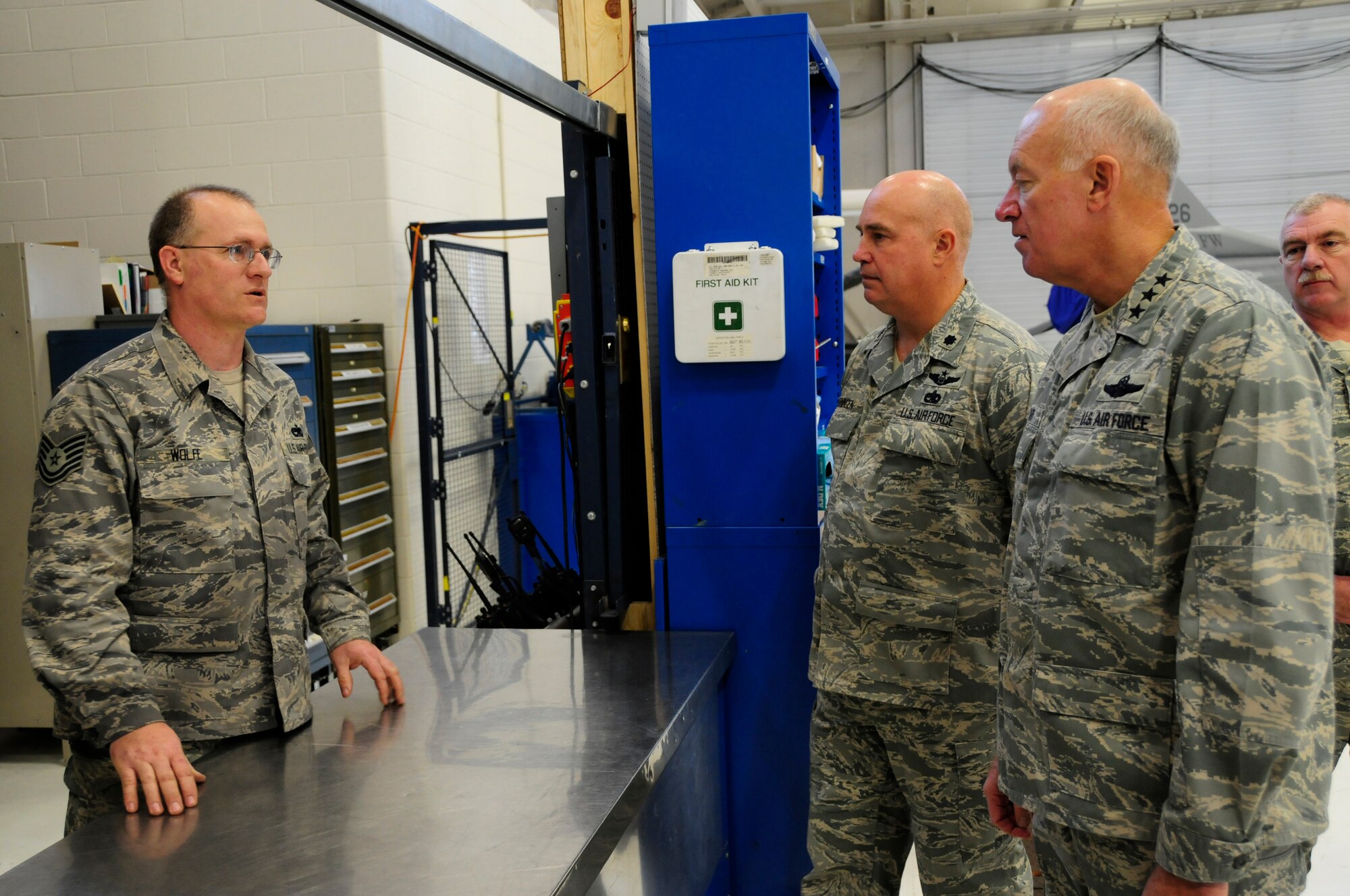 U.S. Air Force Lt. Gen. Harry Wyatt, Director of the Air National Guard, speaks with Tech. Sgt. Robert Wolf about the state of the art tool accountability system in the aircraft hanger at the 148th Fighter Wing Air National Guard base in Duluth, Minn. Dec. 11th, 2009.  Lt. Gen Wyatt toured the guard base to better understand the facilities and mission capabilities at the wing. (U.S. Air Force photo by Master Sgt. Jason W. Rolfe)