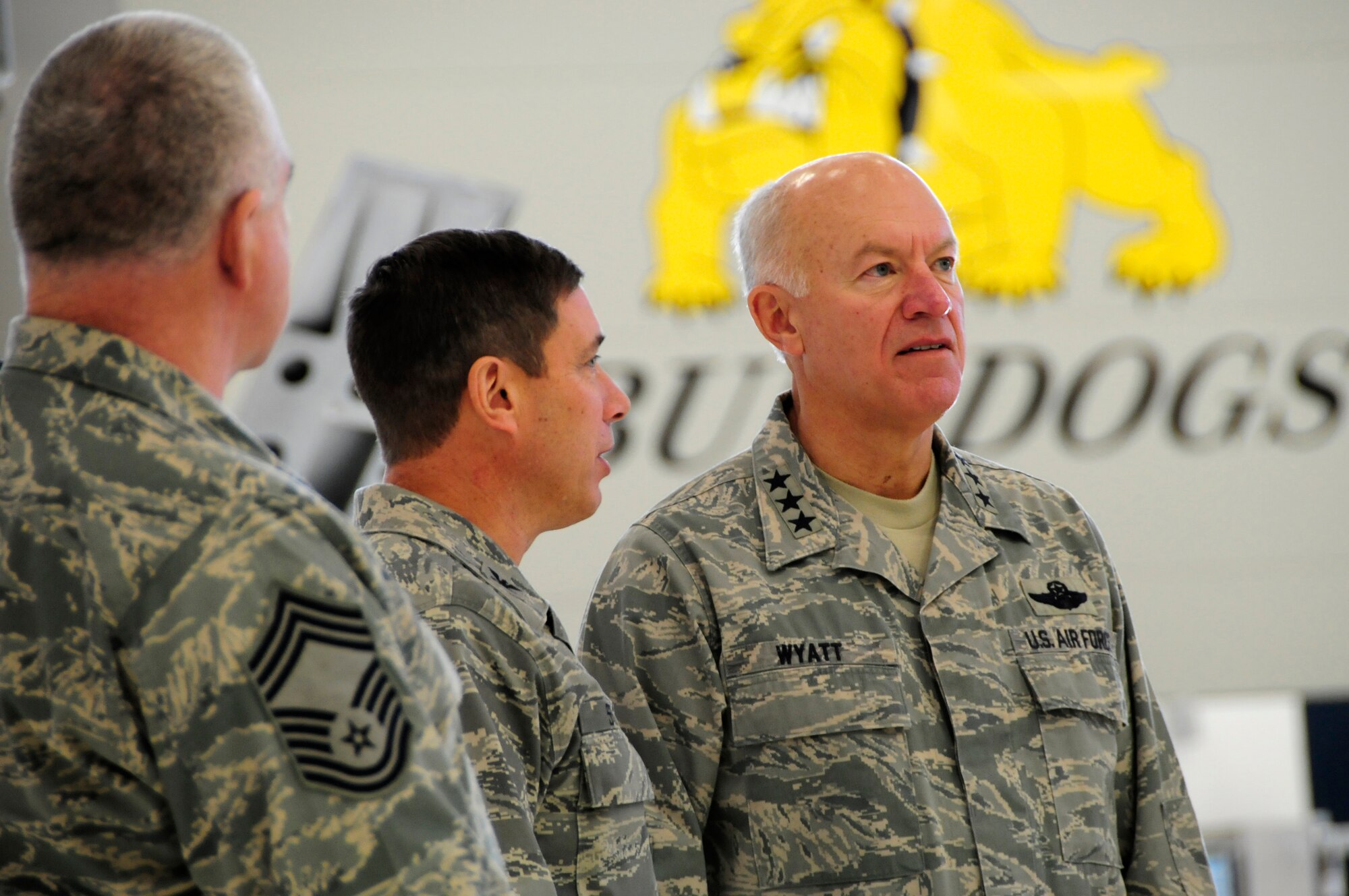 U.S. Air Force Lt. Gen. Harry Wyatt, Director of the Air National Guard, listens to Col. Frank Stokes, 148th Fighter Wing Commander, about the capabilities of the maintenance facility at the 148th Fighter Wing Air National Guard base in Duluth, Minn. Dec. 11th, 2009.  Lt. Gen Wyatt toured the guard base to better understand the facilities and mission capabilities at the wing. (U.S. Air Force photo by Master Sgt. Jason W. Rolfe)