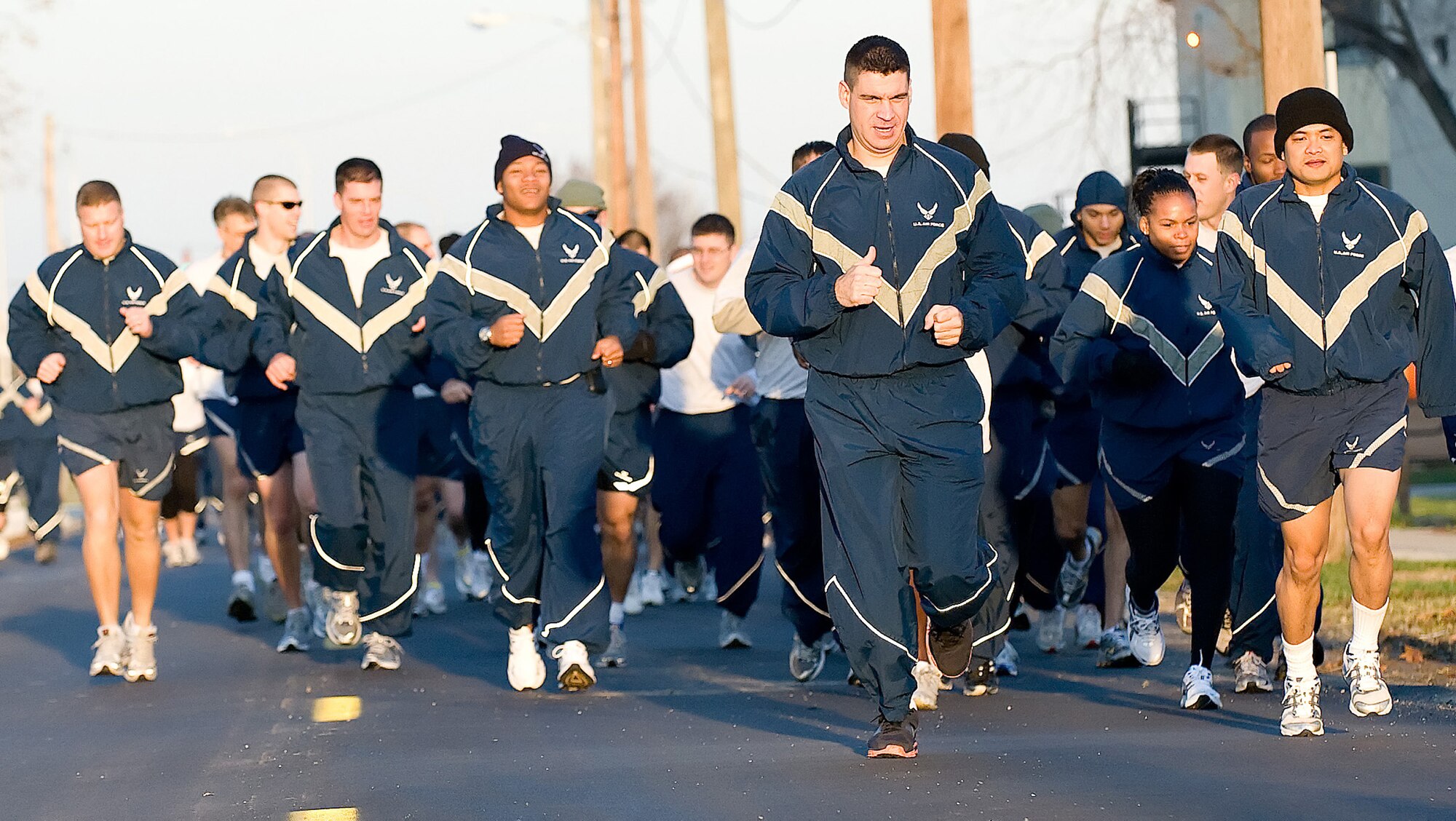 More than 125 Airmen participated in the 436th Medical Group Wingman Day fun run Dec. 4. Wingman Day is a day set aside to build camaraderie, help Airmen embrace the culture of 'Airmen taking care of Airmen,' and a day to step back from daily work to see the big picture - the Air Force family and the mission.  (U.S. Air Force photo/ Jason Minto)