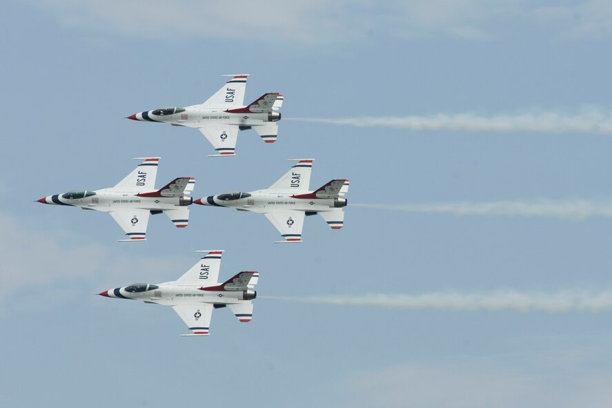 The Thunderbirds, the Air Force’s premiere demonstration team, fly over McConnell Air Force Base, Kan. during the base’s 2006 Open House. Thunderbird officials recently released the 2010 air show schedule announcing the team will again perform at McConnell during the base’s upcoming Open House Sept. 25 and 26. (U.S. Air Force photo/Staff Sgt. Jamie Train)