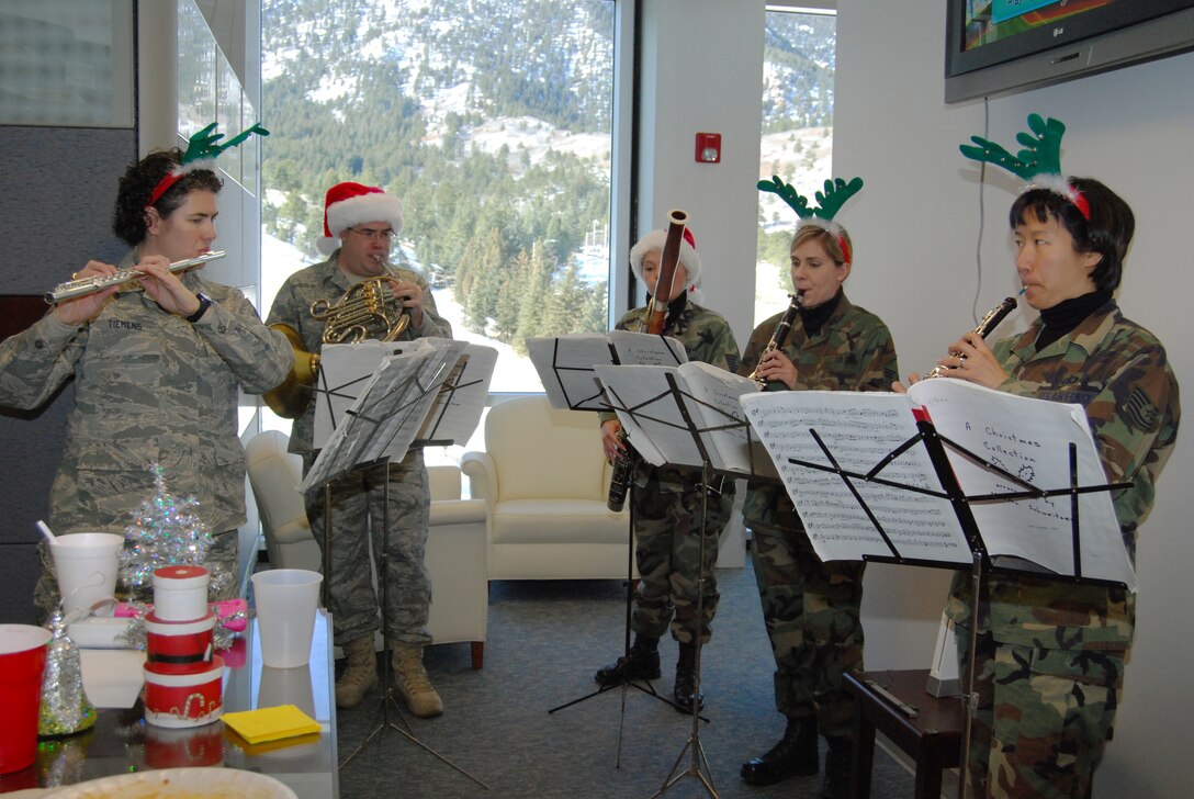 Members of the Air Force Academy Band's Rampart Winds ensemble perform in Harmon Hall at the Academy Dec. 11, 2009. Playing are group leader Master Sgt. Sandra Tiemens on flute, Tech. Sgt. Kenneth Frank Soper on French horn, Tech. Sgt. Sarah Stewart on bassoon, Master Sgt. Noelle Little on clarinet, and Tech. Sgt. Monica Ding on oboe. Rampart Winds is the Academy Band's dedicated woodwind quintet and has played for high-profile events such as the opening of the D-Day Museum in New Orleans. (U.S. Air Force photo/Staff Sgt. Don Branum)
