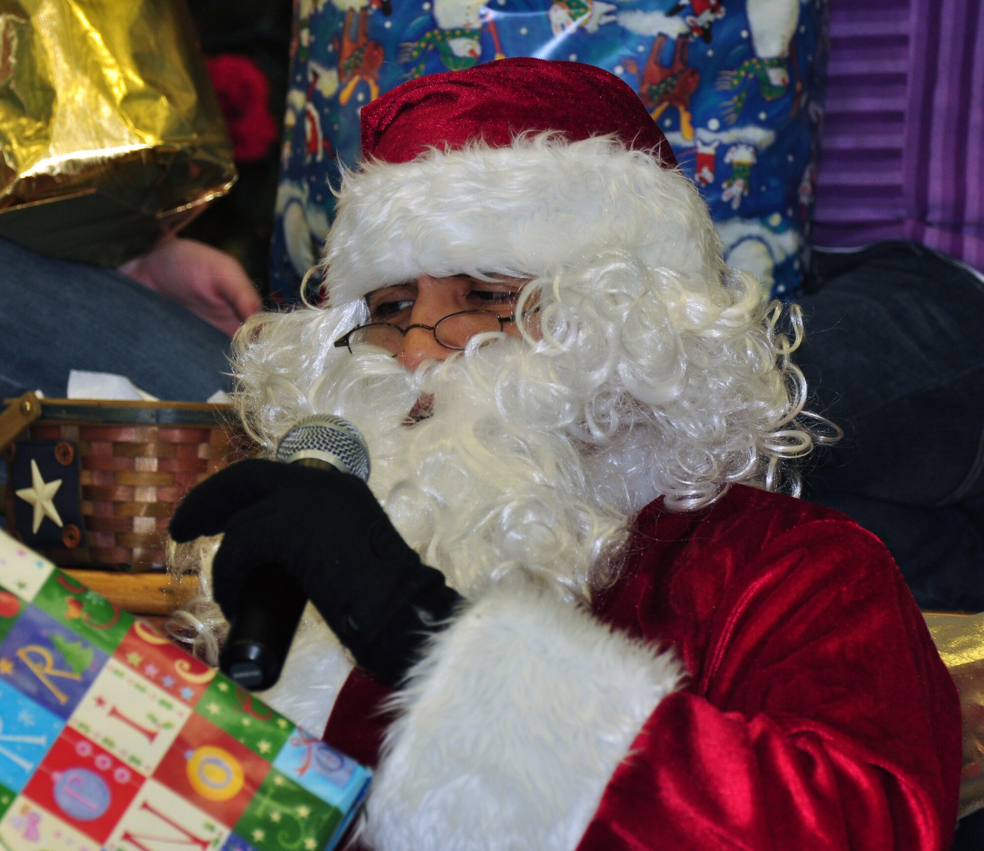 Pope Airmen hosted a Christmas party for children from the Falcon Children’s Home Dec. 5. The children played basketball at the base fitness center and danced in the Pope Elementary School. They were treated to lunch, arts and crafts, games and a visit from Santa complete with gifts. (U.S. Air Force photo by Tech. Sgt. Steven Kennedy)