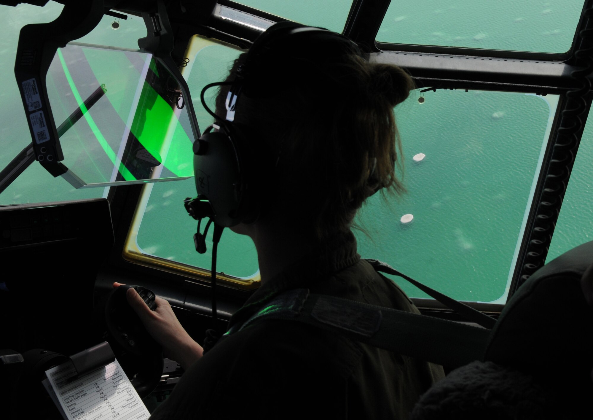 U.S. Air Force Capt. Sarah Santoro, 37th Airlift Squadron mission commander for the Israel off station training, navigates over the Dead Sea, the lowest point in the world, Dec. 6, 2009. Ramstein units participated in a 10-day training exercise to accomplish training requirements because of the strict air restrictions in Germany. (U.S. Air Force photo by Airman 1st Class Alexandria Mosness) 