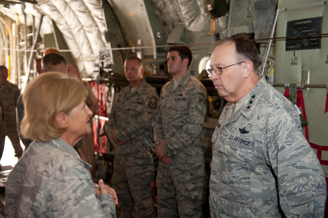 Lt. Gen. Charles E. Stenner Jr., Air Force Reserve Command commander, talks with Lt. Col. Norma Farrell, 379th Expeditionary Aeromedical Evacuation Squadron, during a tour of the C-130J Hercules, Dec. 7, 2009. General Stenner was traveling throughout Southwest Asia visiting Reservists deployed in support of operations Iraqi Freedom and Enduring Freedom. (U.S. Air Force photo/Staff Sgt. Robert Barney).