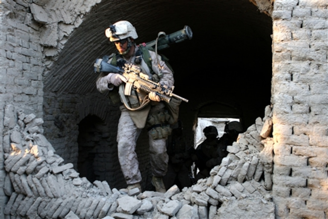 U.S. Marines conduct combat operations in Now Zad, Afghanistan, during Operation Cobra's Anger, Dec. 4, 2009. Operation Cobra's Anger disrupted enemy supply lines and communication in Now Zad, once a safe haven for Taliban forces. The Marines are assigned to the 3rd Battalion, 4th Marine Regiment.