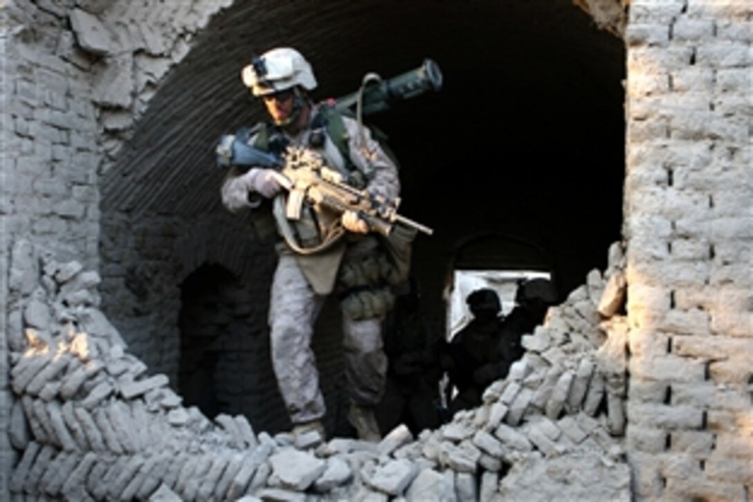 U.S. Marines with the 3rd Battalion, 4th Marine Regiment, conduct combat operations in Now Zad, Afghanistan, during Operation Cobra's Anger, Dec. 4, 2009. Operation Cobra's Anger disrupted enemy supply lines and communication in Now Zad, once a safe haven for Taliban forces.