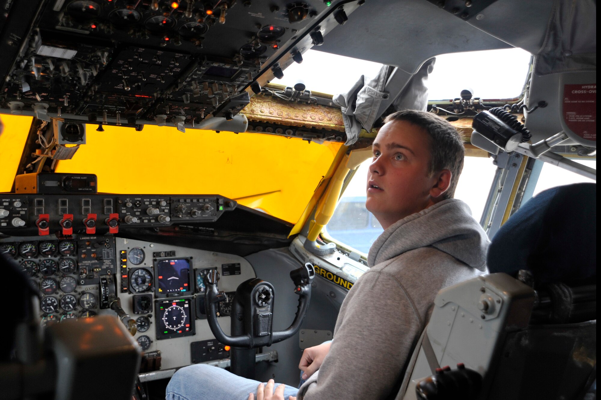 JROTC cadet Master Sgt. Michael Mix, an aspiring pilot, checks out the cockpit of a KC-135 Stratotanker at McConnell Air Force Base, Kan. Airmen from the 931st Air Refueling Group led a tour of the tanker Saturday for his JROTC unit from Jenks High School near Tulsa, Okla. (U.S. Air Force photo/Master Sgt. Jason Schaap)