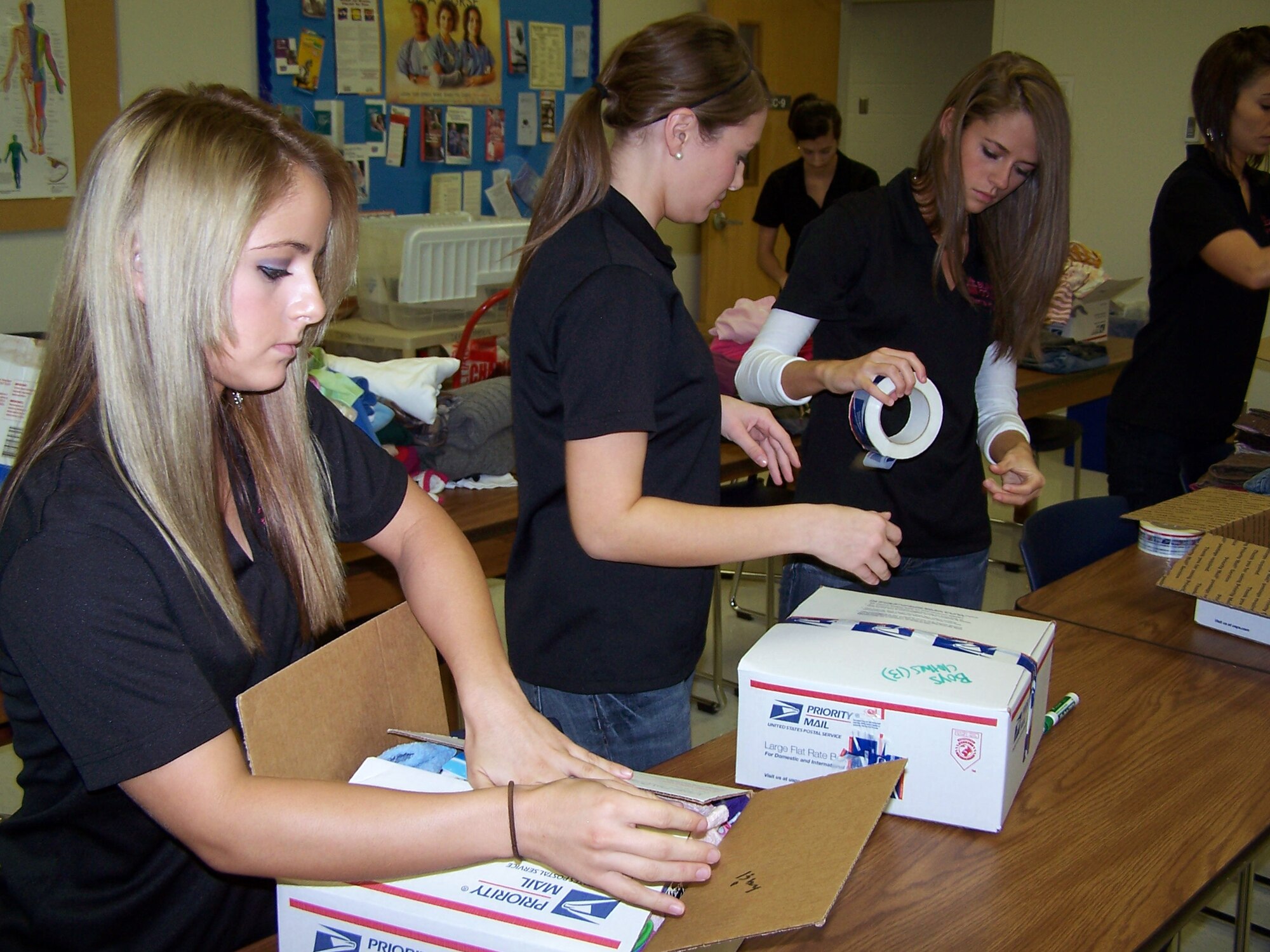 BRYAN, Texas -- Blinn College Dental Hygiene Program students put together boxes of clothing, toys, and necessities to send to Kyrgyz children at the Nizhanchuisk Village Orphanage and School in Kyrgyzstan. The dental students are very active in community service and took time to put together over 50 boxes to send to Kyrgyzstan in November. (Courtesy Photo)