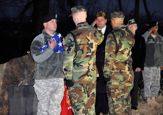 Honor Guard members pass the flag in a memorial ceremony dedicated to
Col. Lewis Millett, an Army veteran of three wars who received the Medal of
Honor for leading a bayonet charge up at Hill 180 located here at Osan Air
Base, Republic of Korea Dec. 14. Colonel Millett died Nov. 14 at 88 years old.
Colonel Millett served 31 years in the Army and had a career that included
service in World War II, Korea, and Vietnam. Colonel Millett received
numerous awards, including the Distinguished Service Cross, the Silver Star, two
Legions of Merit, three Bronze Stars, four Purple Hearts, and three Air
Medals. (U.S. Air Force photo/Senior Airman Stephenie Wade)
