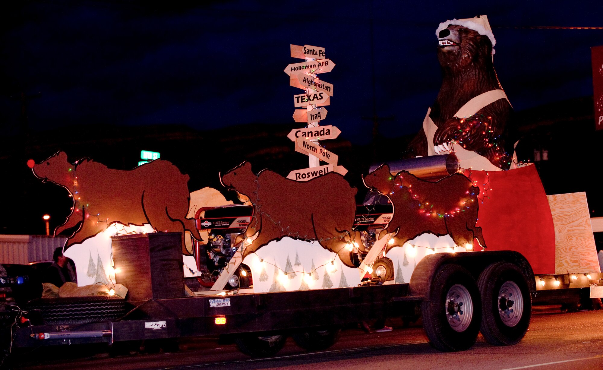 ALAMOGORDO, N.M. -- The 49th Material Maintenance Group float makes its way down the road during the Chamber of Commerce Christmas parade here Dec. 12. The Chamber of Commerce holds the parade of lights every year during the holiday season. (U.S. Air Force photo by Tech. Sgt. Alan Port)