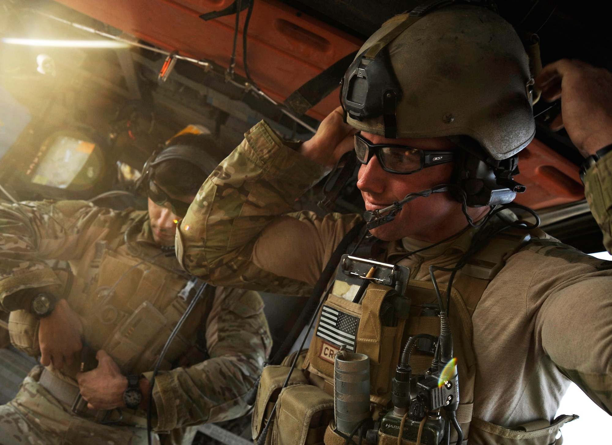 A U.S. Air Force Combat Rescue Officer from the 66th Expeditionary Rescue Squadron stationed at Davis-Monthan AFB, Ariz., deployed to Camp Bastion, Afghanistan, prepares his gear, Dec. 7, 2009.  The members of the 66th ERQS can respond to a medical evacuation in less than seven minutes to pick up patients.  (U.S. Air Force photo/Staff Sgt. Angelita Lawrence)
