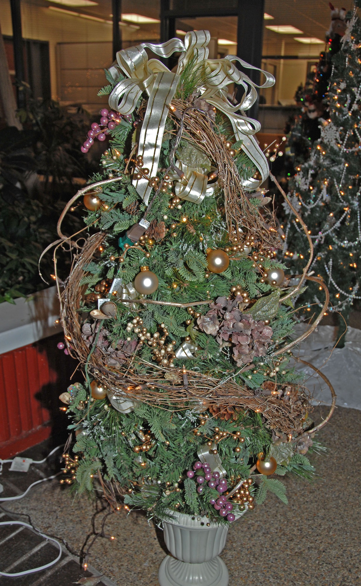TRAVIS AIR FORCE BASE, Calif. -- This is just one of the uniquely decorated trees auctioned off Dec. 4 at Travis Air Force Base, to benefit the Travis Fisher House. Each year, the 60th Maintenance Operations Squadron and the 349th Maintenance Operations Flight host a Tree Festival and Auction for this cause. Fisher Houses were the brainchild of Zachary and Elizabeth Fisher, who wanted to create a foundation to help military families in need, where they can stay, without charge, by the hospital where their military loved one is being treated. Located on the grounds of David Grant USAF Medical Center, the Travis Fisher House is one of more than 30 built by this foundation. This year's festival raised about $2,700. (U.S. Air Force/photo Senior Master Sgt. Ellen L. Hatfield)