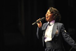 U.S. Air Force Staff Sgt. Natalie Madison sings during the U.S. Air Force Heritage of America Band show at the North Charleston Performing Arts Center in North Charleston, S.C., Dec. 9, 2009. The U.S. Air Force Heritage of America Band has a rich history of inspiring hearts and minds, building and sustaining American patriotism and enhancing esprit de corps in the Air Force. Sergeant Madison is a bandsman with the Air Force Heritage of America Band. (U.S. Air Force photo by James M. Bowman)(Released)