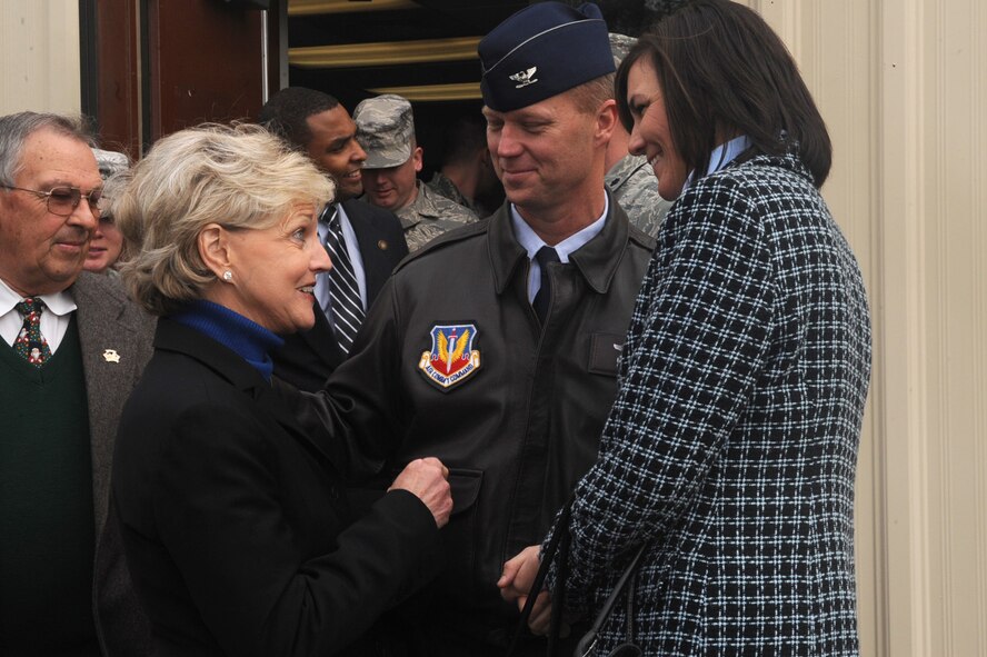 Col. Mark Kelly, 4th Fighter Wing commander, and wife Tanya say goodbye to North Carolina governor Bev Perdue after completing her base tour on Seymour Johnson Air Force Base, N.C., Dec. 11, 2009. Governor Perdue's visit included a mission brief, press conference, and a tour of the child development center and flight line. (U.S. Air Force photo/Staff Sgt. Courtney Richardson)