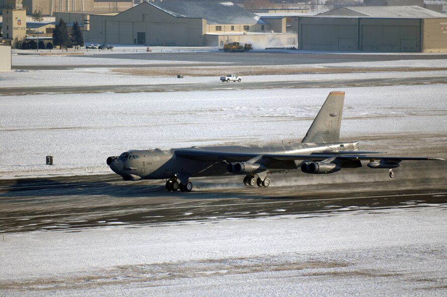 MINOT AIR FORCE BASE, N.D. -- A B-52H Stratofortress flies through the harsh weather during the rapid launch portion of Prairie Vigilance here Dec. 10. Prairie Vigilance 10-9 is a combined nuclear operational readiness exercise designed to demonstrate safe, secure, reliable nuclear weapons standards and procedures. (U.S. Air Force photo by Airman 1st Class Aaron-Forrest Wainwright)
