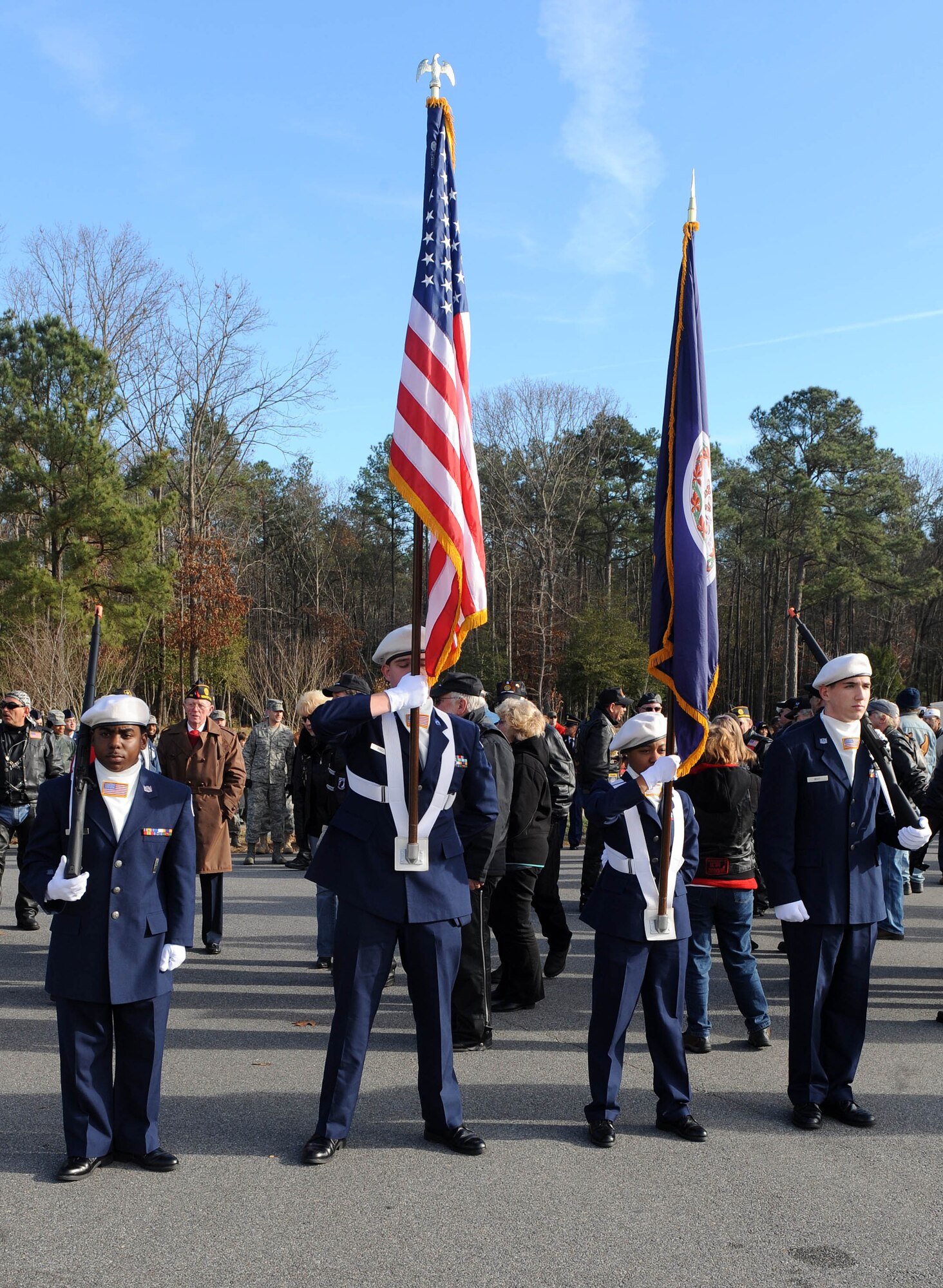SUFFOLK, Va. -- The Kingsfork High School Air Force Junior Reserve Officer Training Corps Color Guard stand ready to lead everyone to the wreaths during the Wreaths Across America program Dec. 12. Military personnel and the local community laid 2,250 wreaths on the headstones of fallen veterans.  (U.S. Air Force photo/Senior Airman Zachary Wolf) 