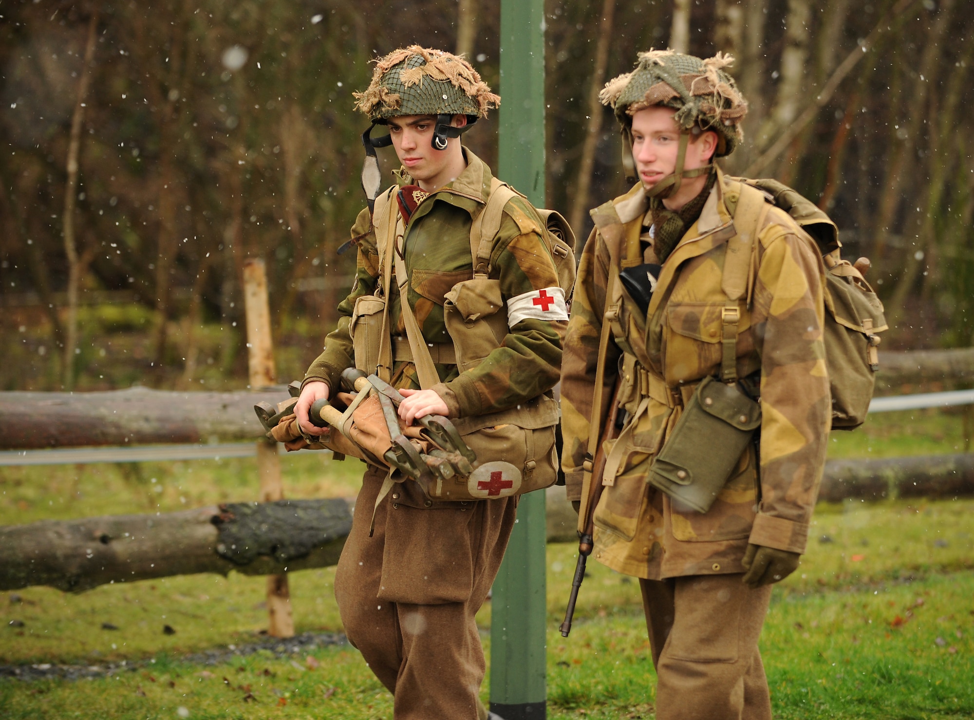 BASTOGNE, Belgium -- World War II reenactors walk along a trail Dec. 12 during the 32nd Bastogne Historic Walk here in Bastogne. Despite the snow and cold, more than 4,500 people from across Europe and the world participated in the event. (U.S. Air Force photo/Airman 1st Class Nathanael Callon)