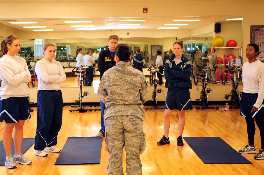 BARKSDALE AIR FORCE BASE, La. -- Staff Sgt. Saray Moniz, physical training leader from the 2d Medical Operations Squadron is inspected on her ability to test and evaluate her squadron members during a conventional operational readiness inspection, Dec. 12. Squadron PTLs were chosen at random to perform the new Air Force standard for physical training tests that will go into effect in January to ensure Barksdale understanding and compliance of the new program. (U.S. Air Force photo by Senior Airman Joanna M. Kresge) 