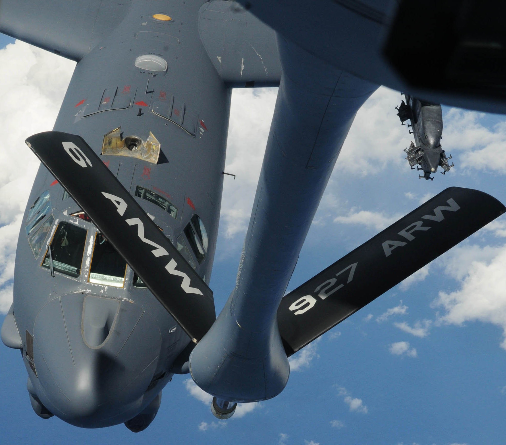 ANDERSEN AIR FORCE BASE, Guam - A 506th Expeditionary Air Refueling Squadron KC-135 Stratotanker, deployed to Andersen AFB works with a B-52 Stratofortress, also deployed here, in order to perform an aerial refueling of the bomber. The refueling was executed as part of Andersen AFB’s support of Australia’s East Coast Air Defense Exercise. (U.S. Air Force photo by Airman 1st Class Julian North)