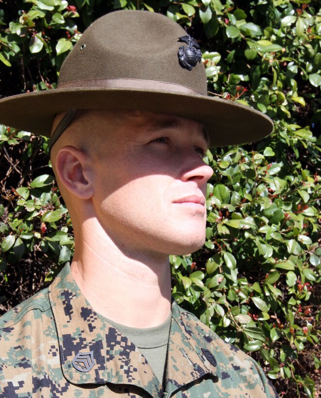 Staff Sgt. Heath A. Gomez, seinor drill instructor, Platoon 2122, Company F, awaits the graduation of his cycle so he can enjoy his extreme hobbies. Gomez participates in surfing, riding dirt bikes and cycling. These activities leaves him feeling refreshed, energized and ready to motivate new recruits.
