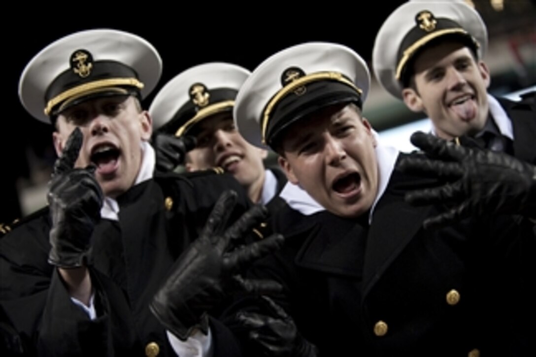 U.S. Naval Academy Midshipmen celebrate their 17-3 victory at the 110th playing of the Army-Navy football game at Lincoln Financial Field, Philadelphia, Pa., on Dec. 12, 2009.  