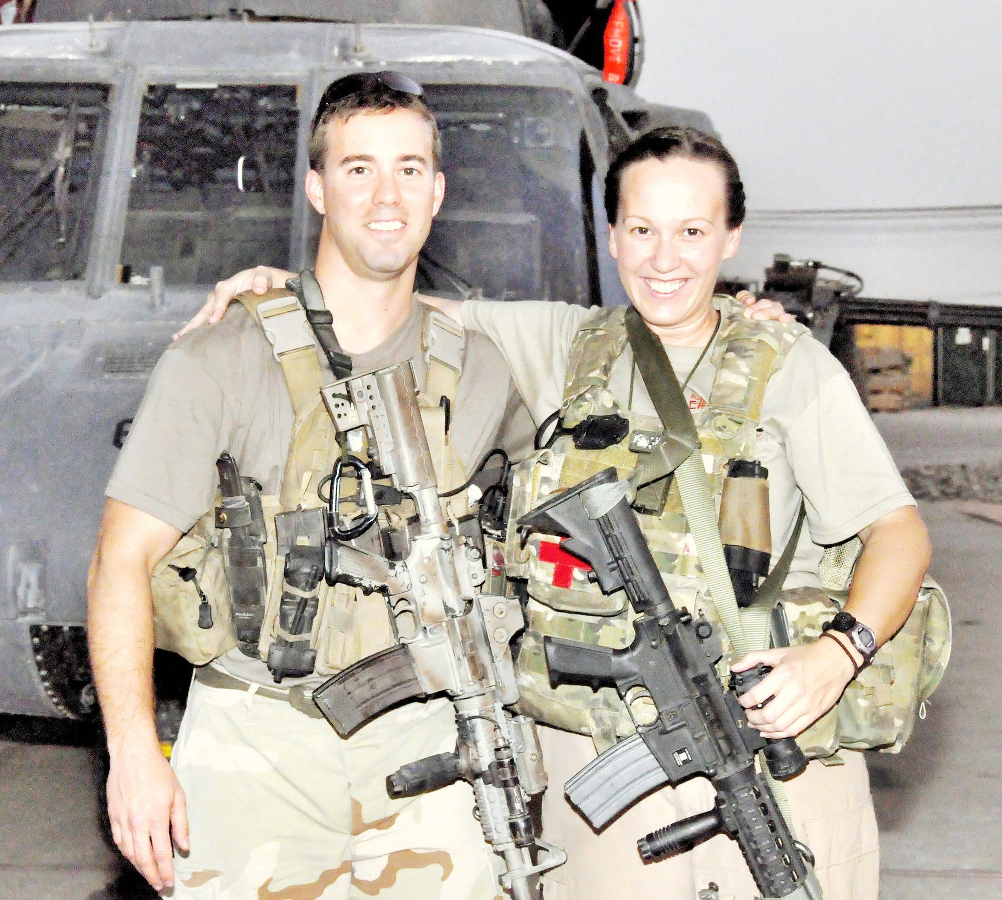 Capt. Mary Jennings stands with Tech. Sgt. Aaron Butler, a pararescueman from the 23rd Wing, Moody Air Force Base, Ga. Sergeant Butler treated Captain Jennings for shrapnel wounds in Afghanistan during a July 29, 2009 rescue mission. Captain Jennings is a co-pilot with the 129th Rescue Wing at Moffett Federal Airfield, Calif. (Courtesy photo)
