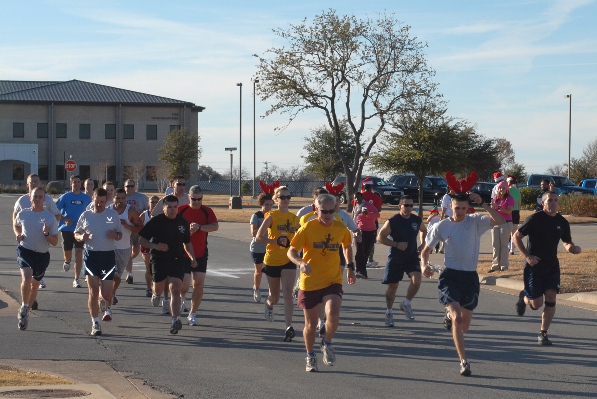 GOODFELLOW AIR FORCE BASE, Texas -- Team Goodfellow members set off on the 2009 Jingle Bell fun run/walk, Dec. 14. The running course was 2.2 miles. (U.S. Air Force photo/Staff Sgt. Laura R. McFarlane)
