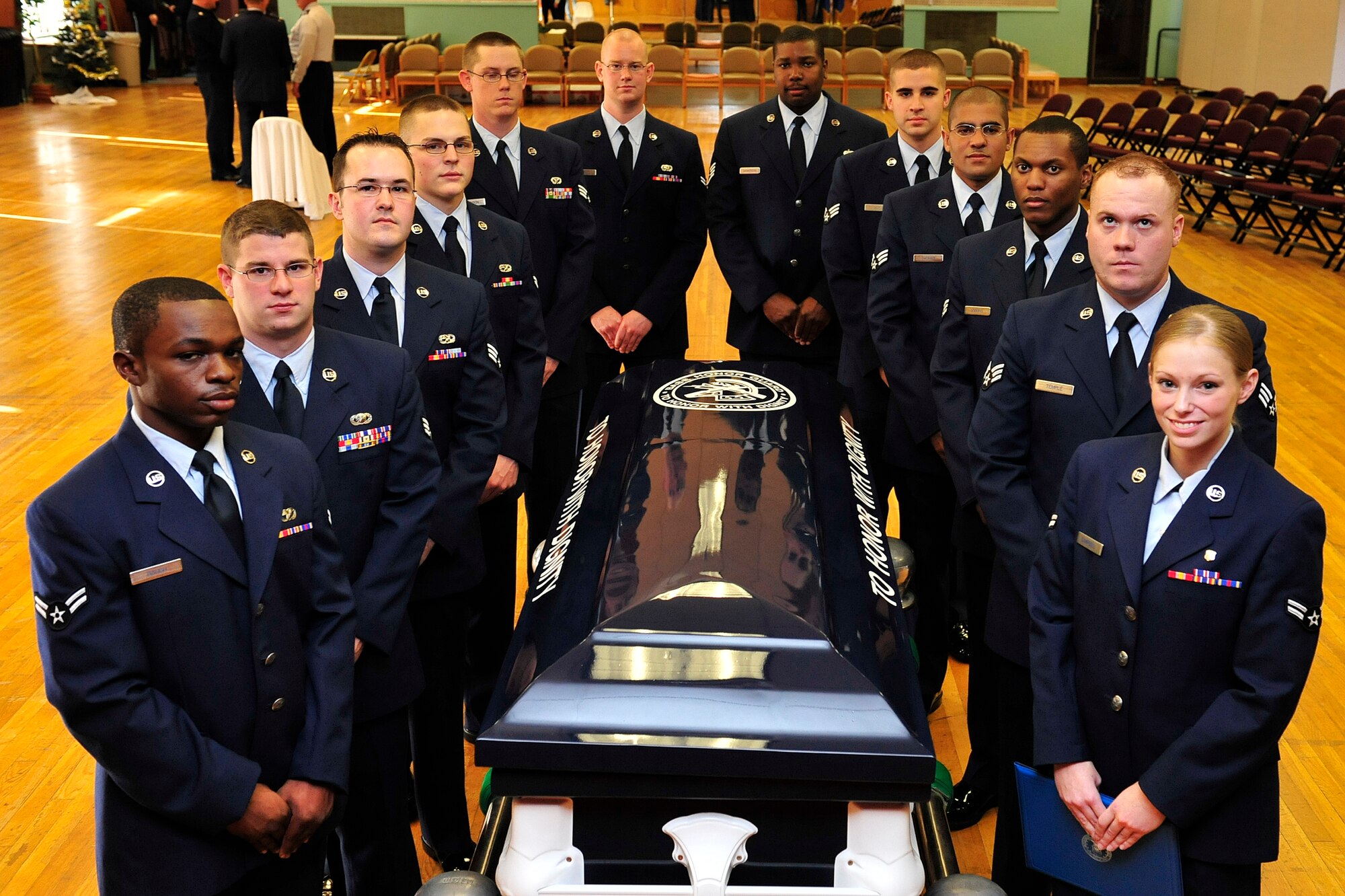 (From left) Airman 1st Class Eric Baugh, Senior Airman Adam Whitman, Senior Airman Christopher Torlincasi, Airman 1st Class Matthew Schmidt, Senior Airman Nathaniel Johnson, Airman 1st Class Matthew Gierak, Staff Sgt. Jermaine Hankerson, Airman 1st Class Elija Roy, Senior Airman Joseph Thomas, Senior Airman Jamel Dobbins, Airman 1st Class Hunter Temple and Airman 1st Class April Campbell graduate as the newest Honor Guard members Dec. 14 at a graduation ceremony. The Little Rock Air Force Base Honor Guard mission is to provide military honors for deserving veterans, retirees, active duty, Guard and Reserve members on base, in Arkansas and the surrounding area on behalf of the president of the United States, the department of the Air Force and a grateful nation. (U.S. Air Force photo by Airman 1st Class Lausanne Pacheco)