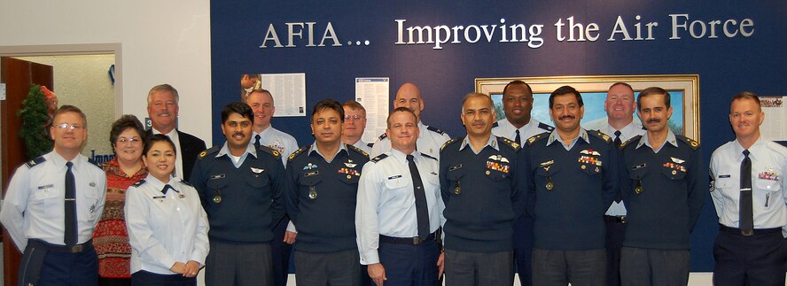 KIRTLAND AIR FORCE BASE, N.M. -- Members from the Air Force Inspection Agency and the Pakistan air force Inspector General pose for a group photo during a visit to Kirtland Air Force Base, New Mexico, Dec. 8. Officers from the Pakistan air force Inspector General visited AFIA to gain information and reference material to improve their various IG programs. President Obama recently stated the U.S. is committed to building a partnership with Pakistan that is built on a foundation of mutual interest mutual respect and mutual trust. U.S. Air Force photo by Jess Gutierrez 