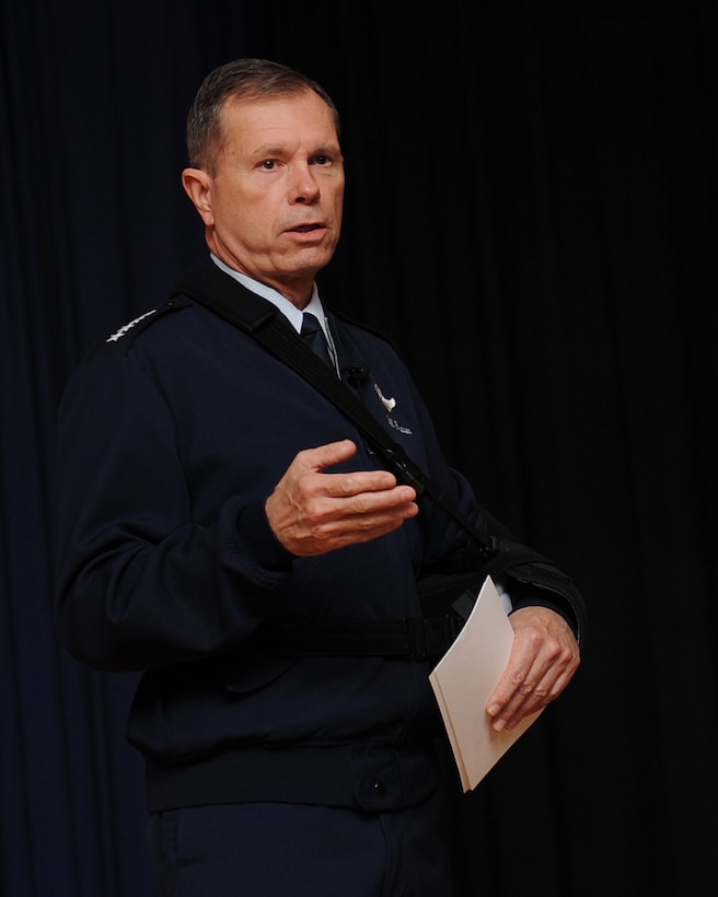 LANGLEY AIR FORCE BASE, Va. -- Gen. William M. Fraser III, Air  Combat Command commander, introduces himself during an All-Call at the Base Theater here Dec. 15. General Fraser spoke to Langley Airmen about safety, priorities, and the direction of ACC and conducted a question and answer session. (U.S. Air Force photo/Airman Rebecca Montez)