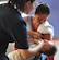 A representative of the Salvadoran Ministry of Health administers anti-parasitic medication to a young boy as his mother holds the child during a Medical Civil Action Program (MEDCAP) here. The boy was one of more than 1,300 patients seen during a two-day medical mission offering residents affected by November flooding and mudslides the opportunity to receive medical care, immunizations, education, and prescription drugs free of charge. It was a combined effort between the Salvadoran government, the U.S. Embassy in El Salvador, and U.S. Southern Command’s Joint Task Force-Bravo – based at Soto Cano Air Base, Honduras. (U.S. Air Force photo/Tech. Sgt. Mike Hammond)