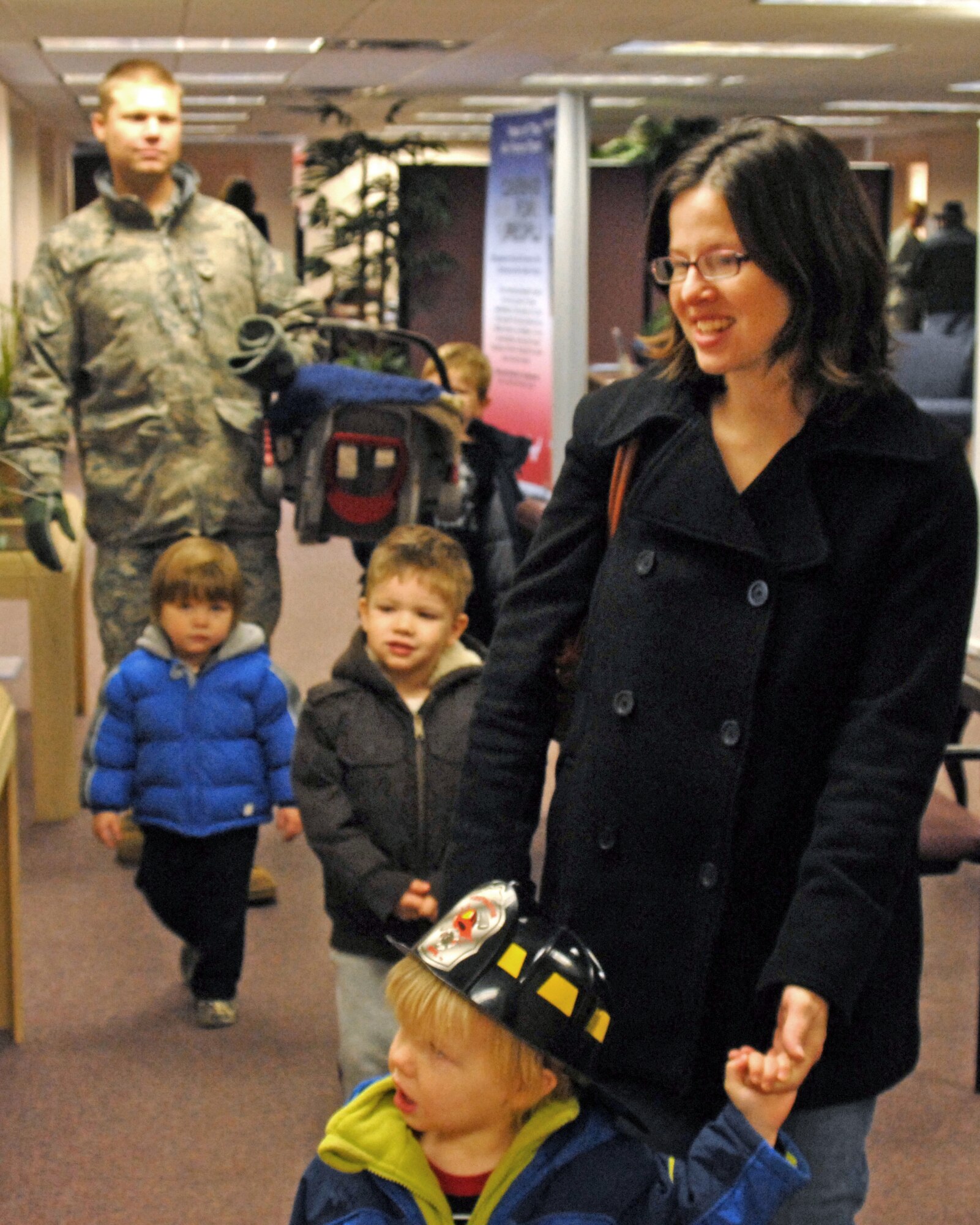 Staff Sgt. Mark Lickliter, 316th Training Squadron, Goodfellow AFB, Texas, wife Nicky and sons Abraham, Apollos, Sebastian, Silas and Boaz tour the Airman and Family Readiness Center here on Dec. 15 during the center’s open house.  July 2009 - July 2010, is the Year of the Air Force Family which on Goodfellow includes all military members, civilians, retirees and families of Air Force, Army, Marine Corps and Navy.  (U.S. Air Force photo/Robert D. Martinez)