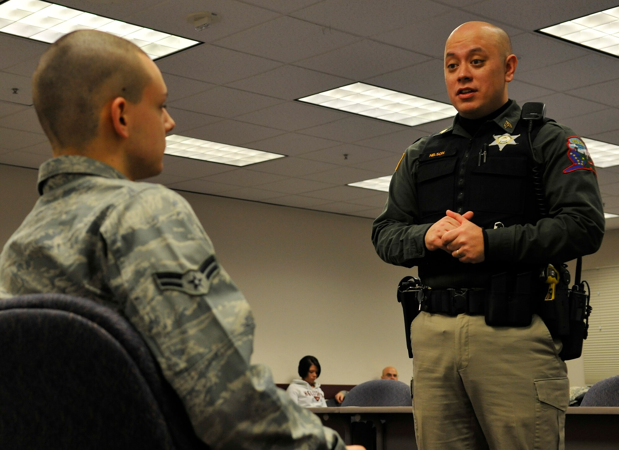 Sgt. Kevin Nelson questions 354th Security Forces Airmen during a mock driving under the influence court case Dec. 11, 2009, Eielson Air Force Base, Alaska. The mock court case was part of the field sobriety training provided by the North Pole Police Department provided to Security Forces members. Sergeant Nelson is a Patrol Sgt. assigned to the NPPD. (U.S. Air Force photo/Staff Sgt. Christopher Boitz)