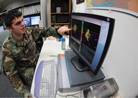 MINOT AIR FORCE BASE, N.D. -- Senior Airman John Read, 5th Operations Support Squadron weather technician, monitors weather conditions for Minot AFB using a next-generation radar here Dec. 14. NEXRAD is a network of 159 high resolution Doppler weather radars that detect precipitation and atmospheric movement. Airman Read is a Virginia Air National Guardsman on a temporary duty assignment from the 192nd Fighter Wing at Langley AFB, Va. (U.S. Air Force photo by Senior Airman Sharida Jackson)