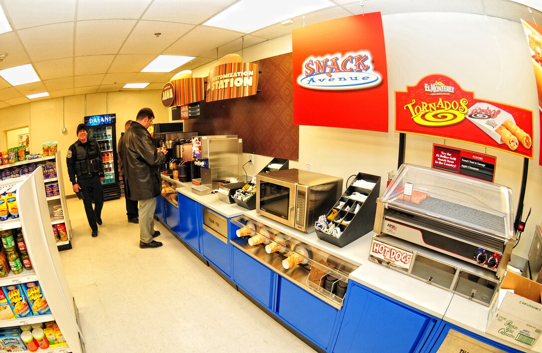 Members of the 914th Airlift Wing, enjoy the new selections at the Base Exchange (BX), December 15, 2009, Niagara Falls Air Reserve Station, NY. The BX now has hot dogs and coffee available during the day as part of an expansion of services available to those serving at the Niagara Falls Reserve Station.  (U.S. Air Force photo by Staff Sgt. Joseph McKee)