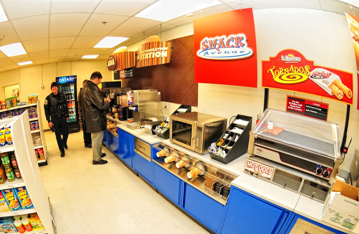Members of the 914th Airlift Wing, enjoy the new selections at the Base Exchange (BX), December 15, 2009, Niagara Falls Air Reserve Station, NY. The BX now has hot dogs and coffee available during the day as part of an expansion of services available to those serving at the Niagara Falls Reserve Station.  (U.S. Air Force photo by Staff Sgt. Joseph McKee)